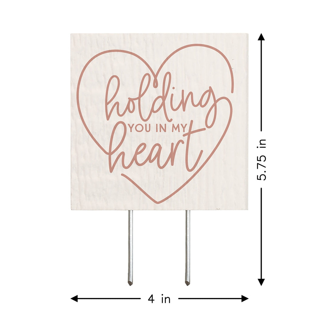 Holding In My Heart