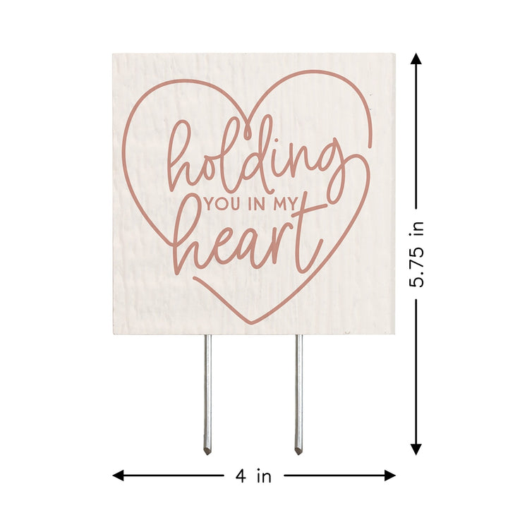 Holding In My Heart